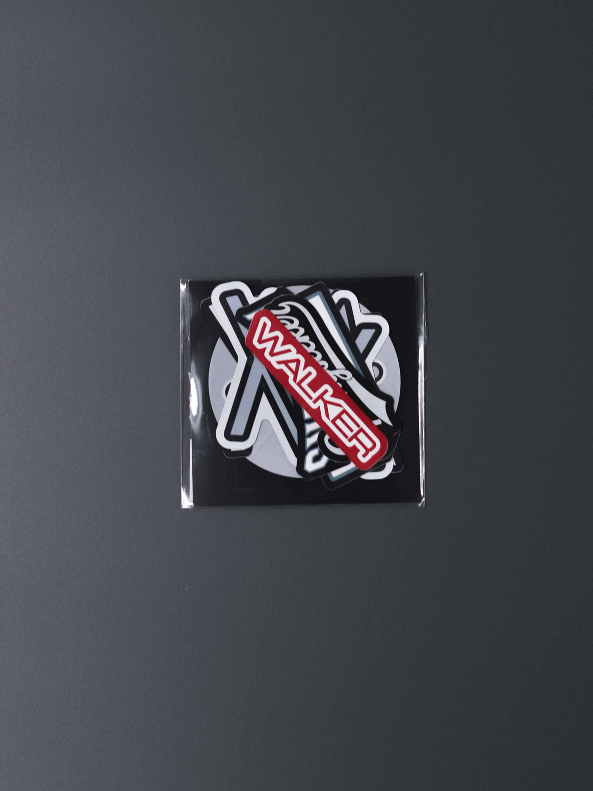 Alan Walker Varsity Sticker Pack close-up of the packaged red Walker varsity decal on a dark backdrop