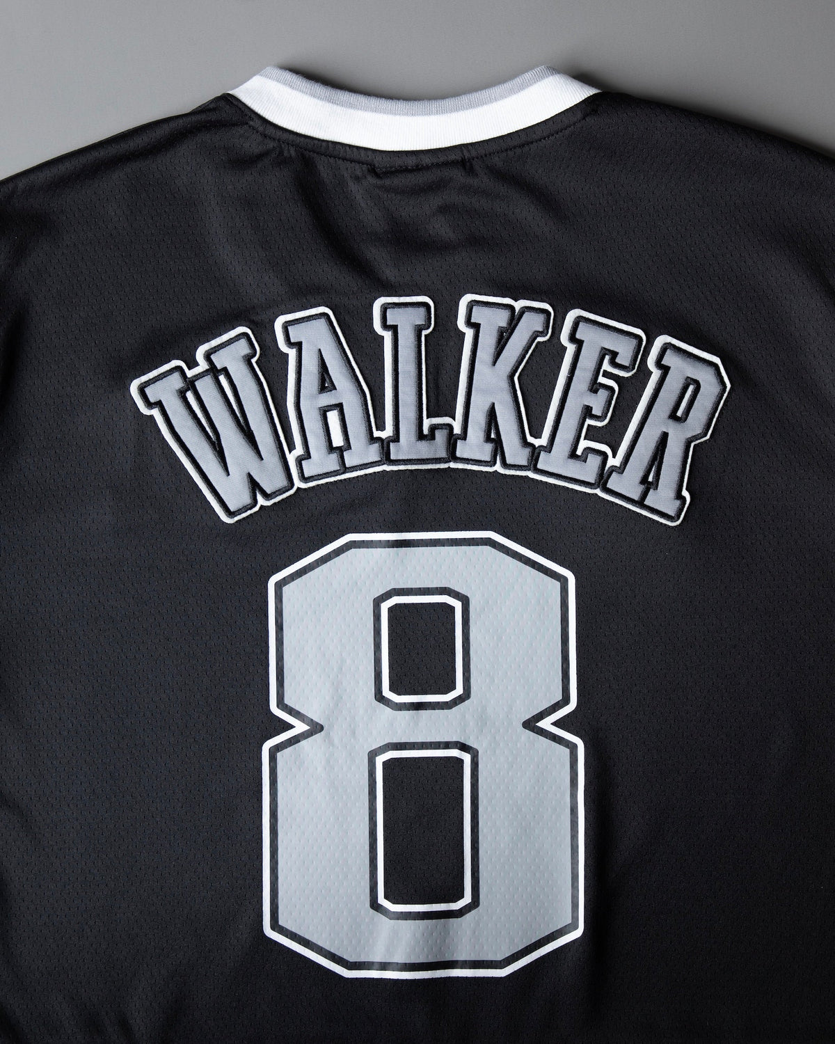 Alan Walker 8 Hockey Jersey back close-up, grey arched Walker nameplate above the large number 8