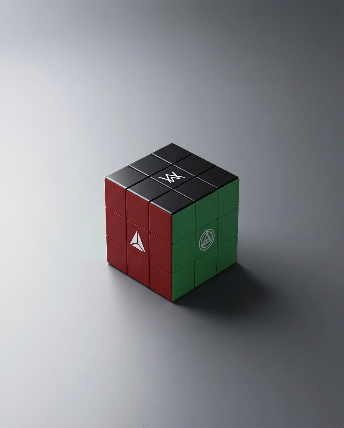 Alan Walker World of Walker Logo Cube shown from another angle with red, green and black printed faces