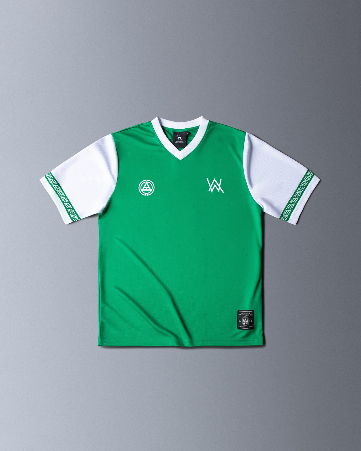 Alan Walker Creator Circle Tribe Bundle jersey flat lay, green shirt with white sleeves and circle crest