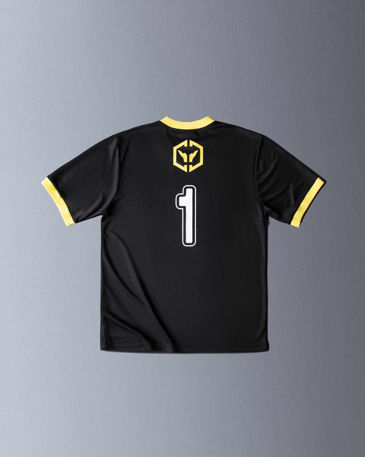 Alan Walker CheckPoint One Tribe Jersey back flat lay, yellow tribe crest above a bold white number 1