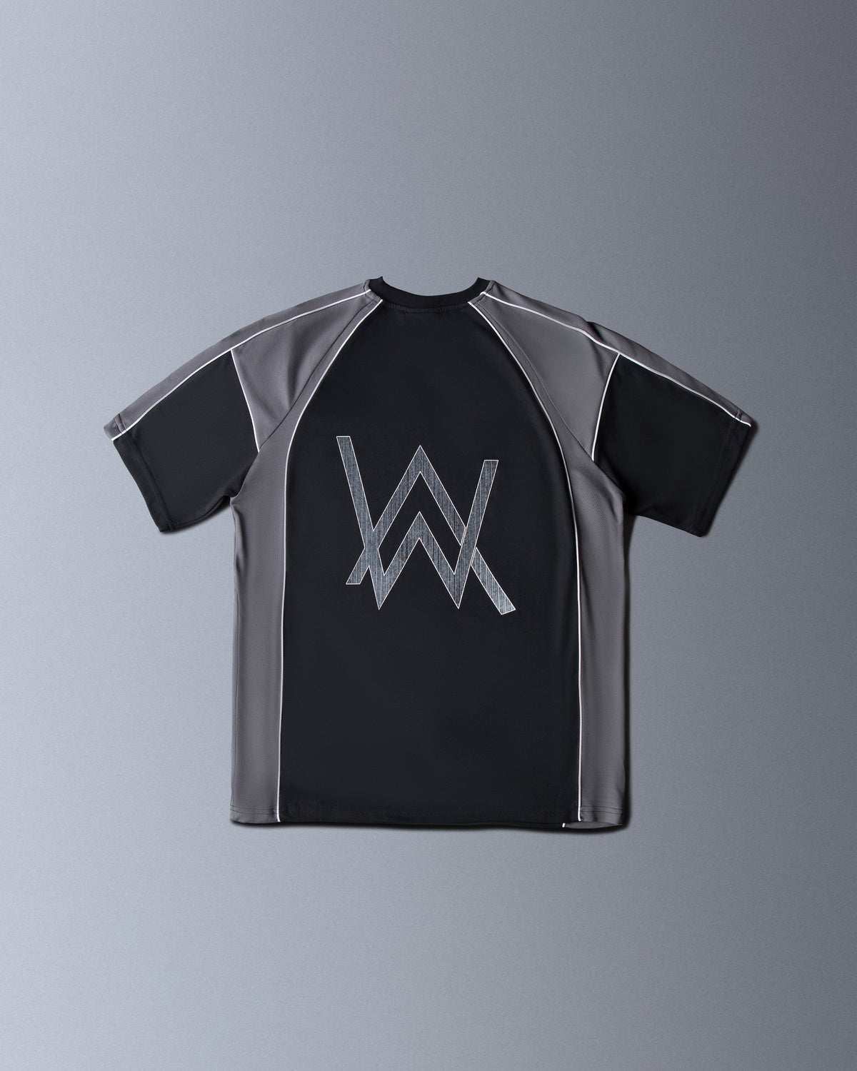 Alan Walker Springseeker Sports T-Shirt back flat lay, black raglan jersey with large silver AW logo print