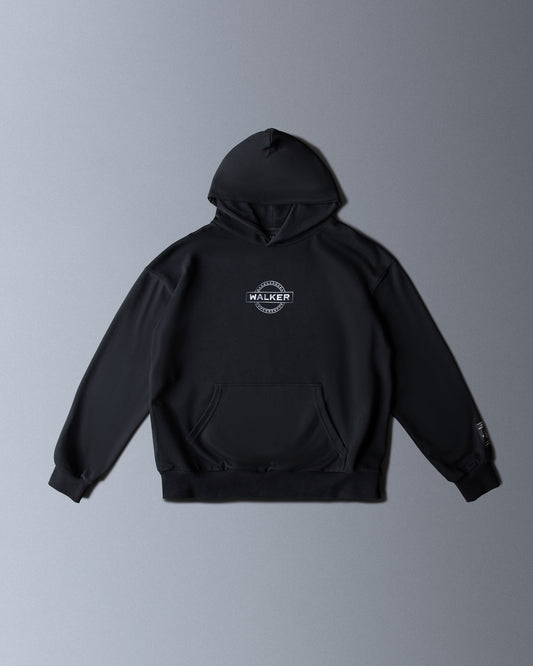 Alan Walker Monster Core Hoodie in black, front flat lay with circular Walker crest logo on the chest