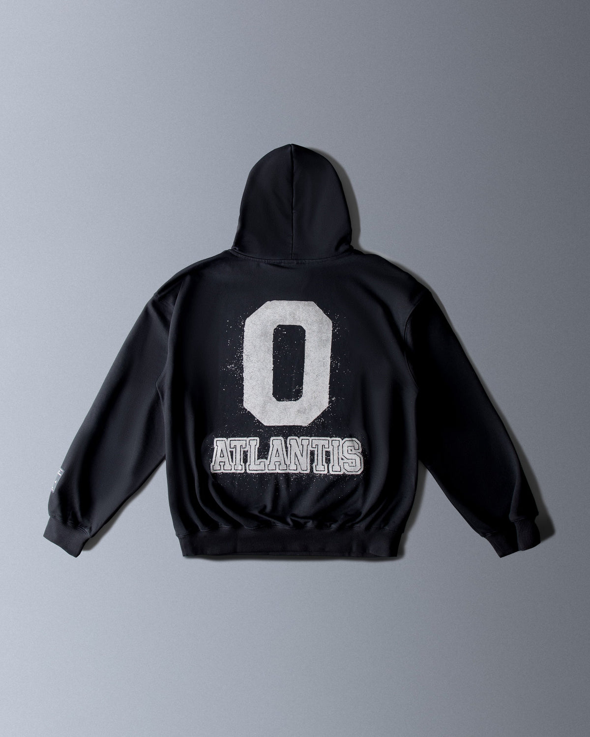Alan Walker Atlantis 0 Hoodie back flat lay, black fleece with a distressed white varsity 0 and Atlantis print