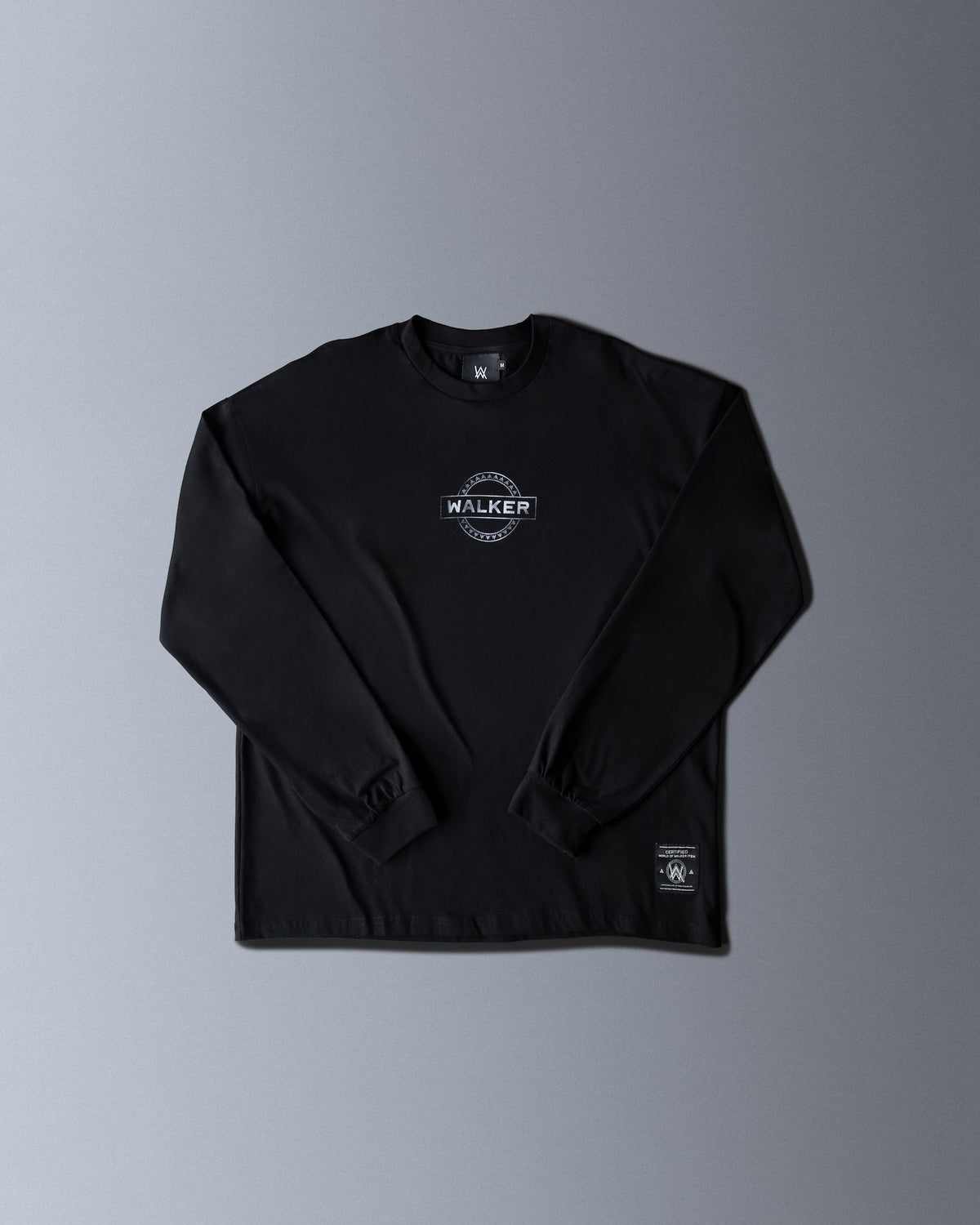 Alan Walker Monster Core Longsleeve front flat lay in black, small silver WALKER stamp on the chest and sleeve tag