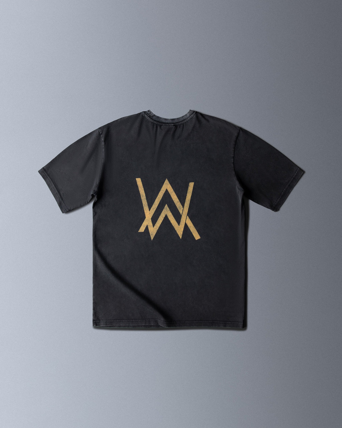 Alan Walker Rise Of The Drone Vintage T-Shirt back flat lay, oversized faded black tee with large gold AW logo