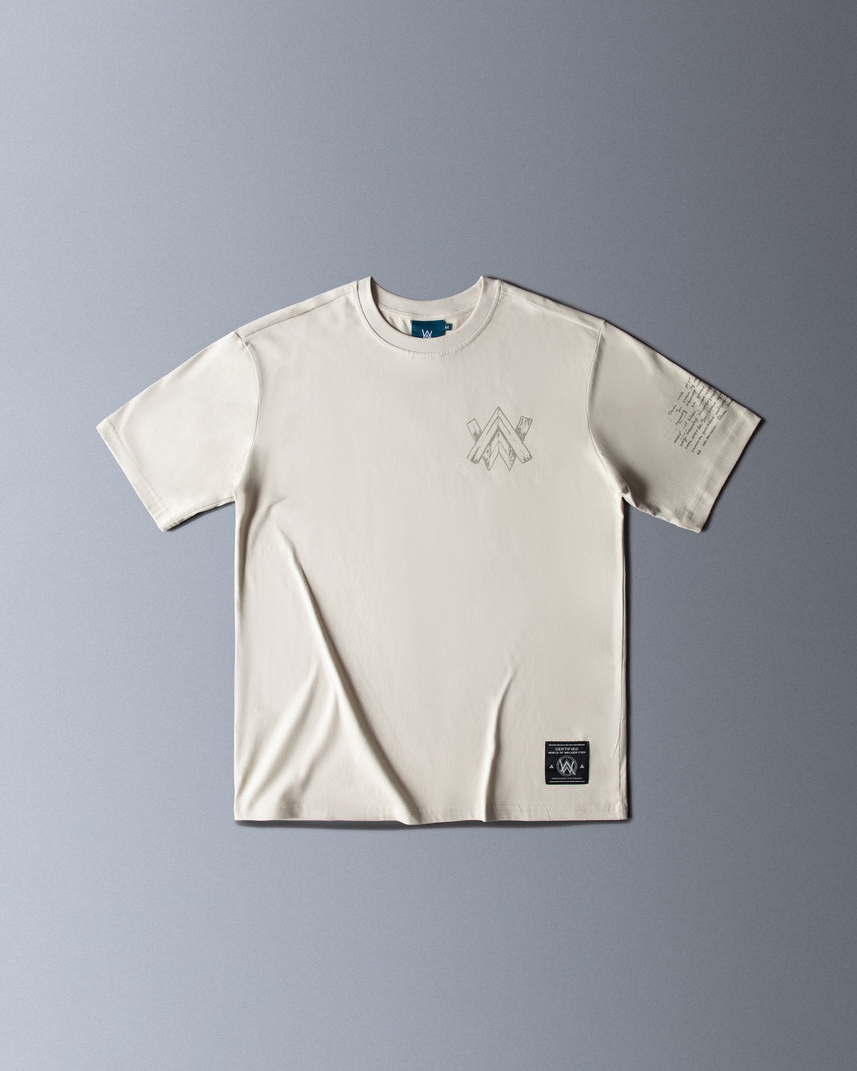 Alan Walker Encyclopedia T-Shirt front flat lay in off white with a grey AW chest logo and woven hem label