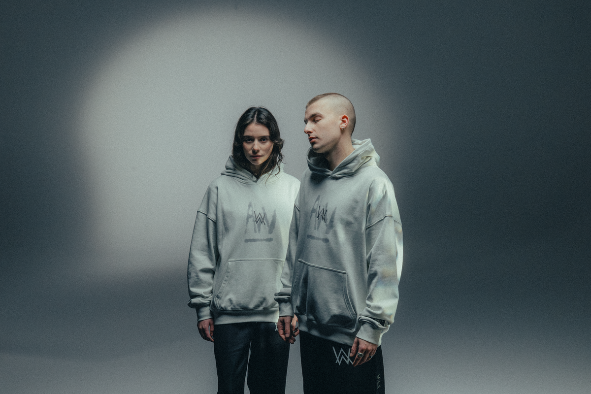 Alan Walker Faded Graffiti Hoodie off white on two models in a full length studio shot, EDM streetwear