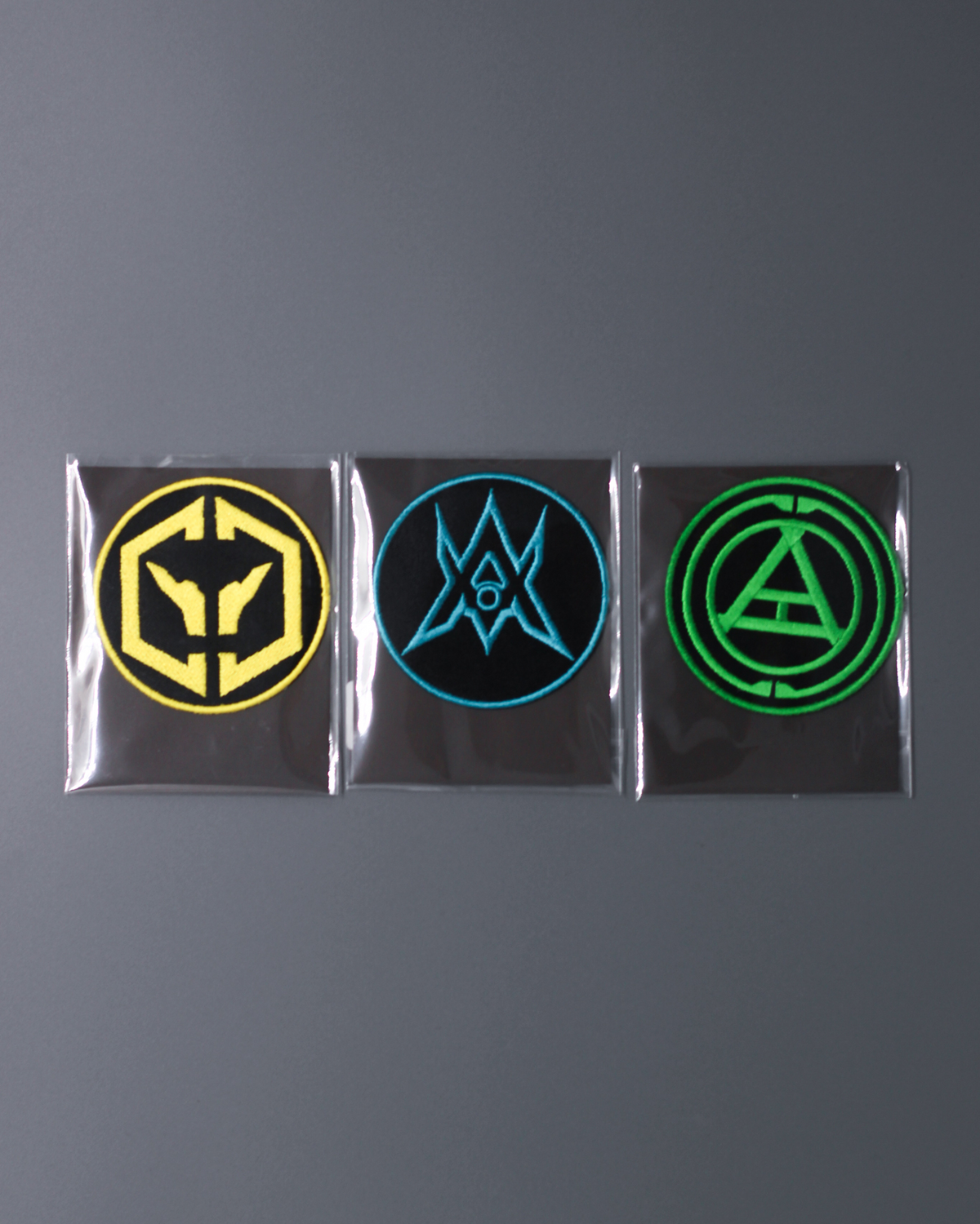 Alan Walker Unity Force Tribe Patch set of three packaged crests in yellow, cyan and green colourways