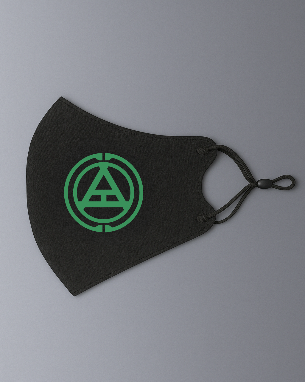 Alan Walker Creator Circle Tribe Bundle face mask, black fabric with a green circle emblem and ear loops