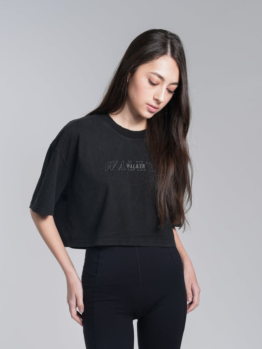 Alan Walker Cropped Tee front on a model, boxy black tee with tonal Walker chest print, EDM streetwear