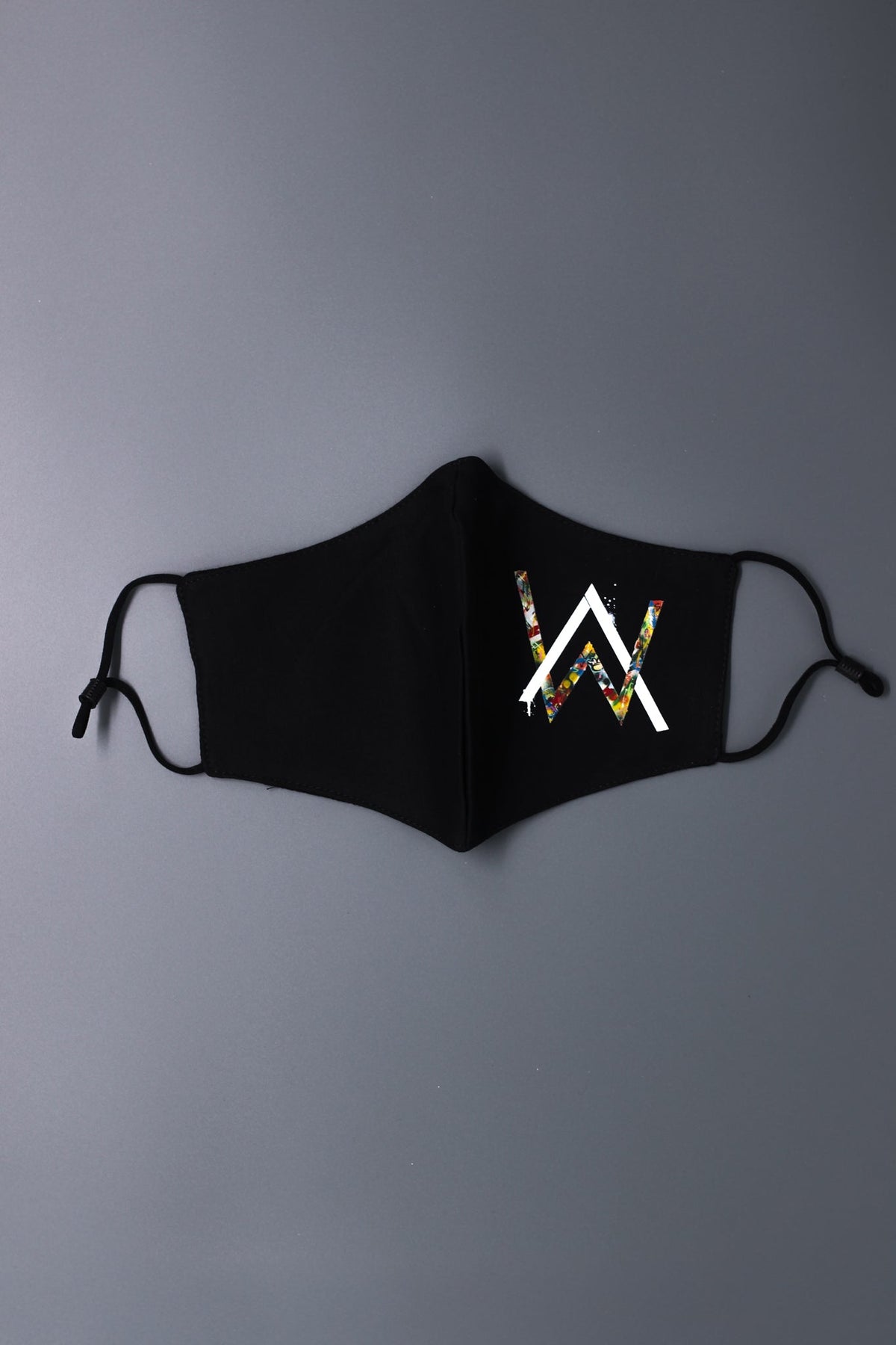 Alan Walker Tired Mask laid flat in black, contoured face mask with the colour-filled AW logo centred