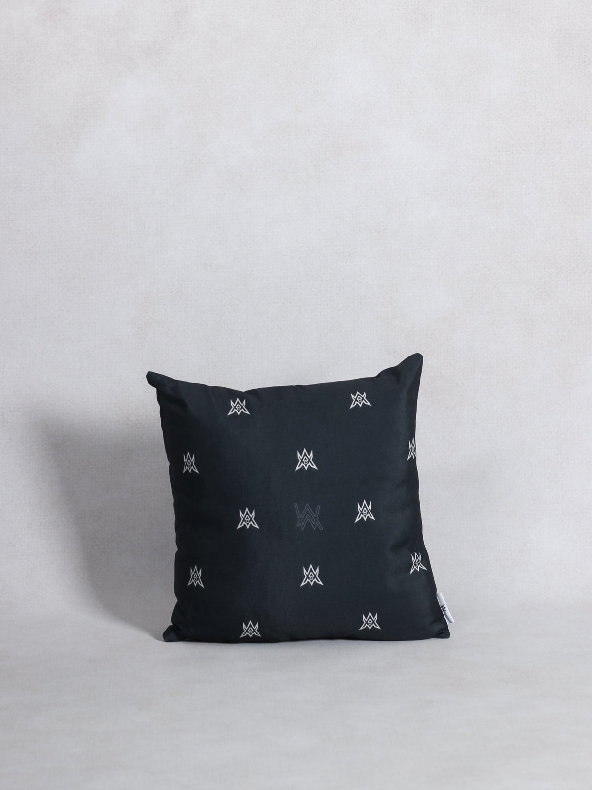 Alan Walker World of Walker Monogram Pillow in black, front view with the repeating silver AW monogram print
