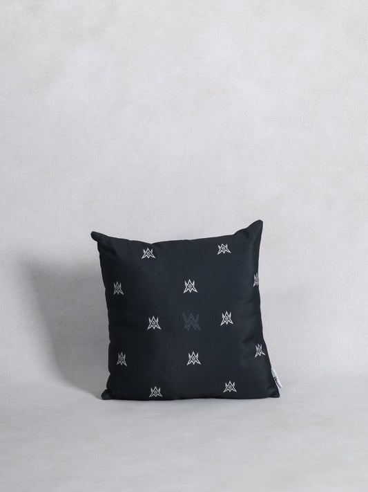 Alan Walker World of Walker Monogram Pillow in black, front view with the repeating silver AW monogram print