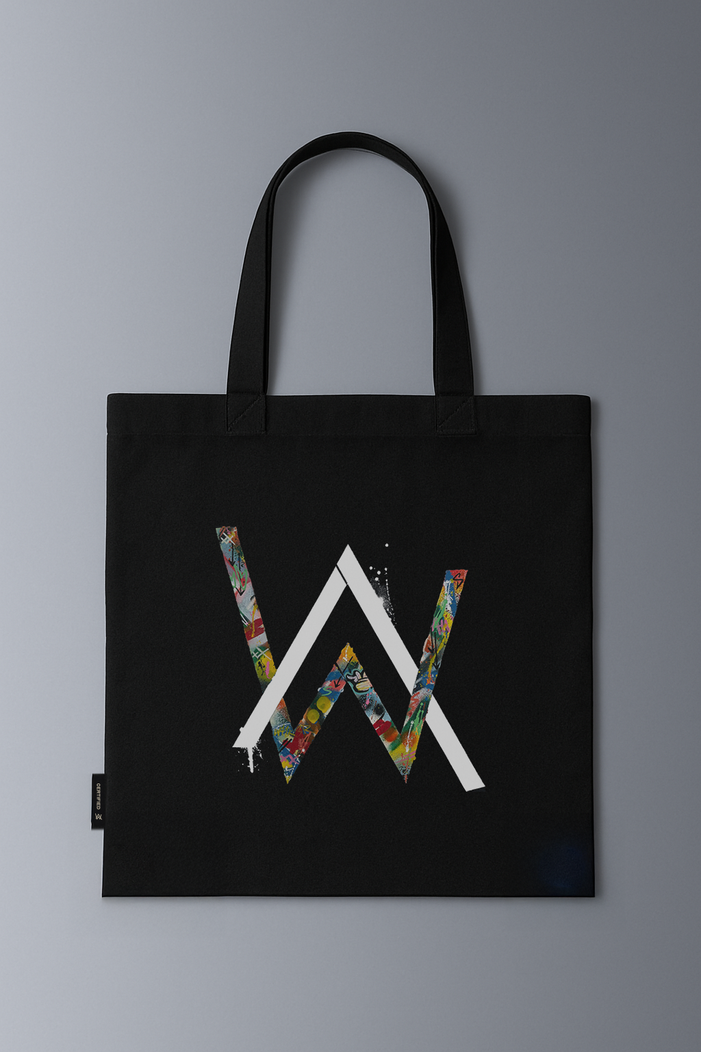 Alan Walker Tired Unity Tote in black, front view of the canvas bag with the colour-filled AW logo print