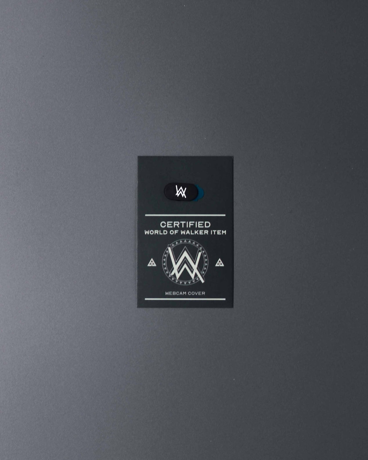 Alan Walker Webcam Cover on its black World of Walker card, slim AW branded laptop camera slider