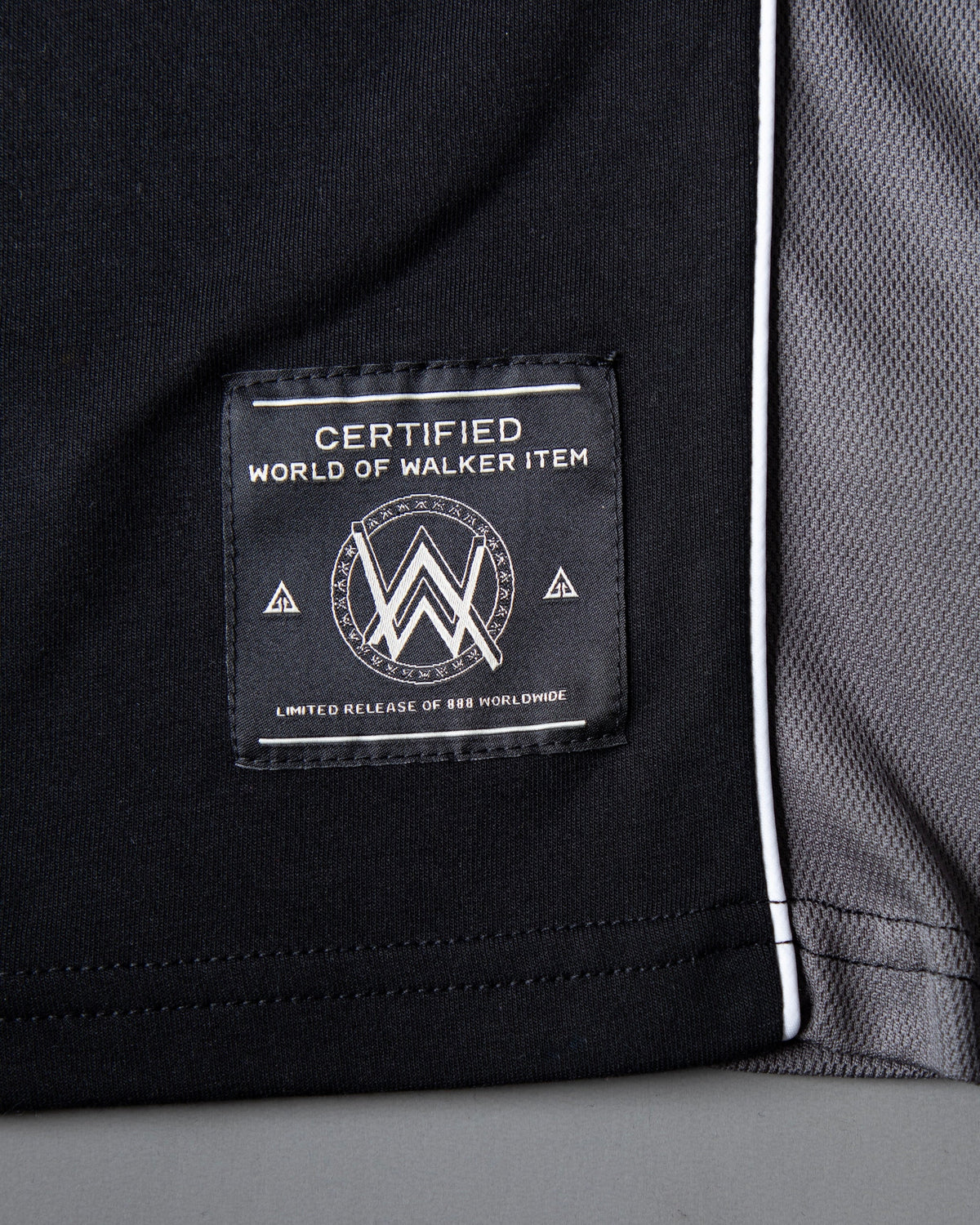 Alan Walker Springseeker Sports T-Shirt hem detail, World of Walker label beside grey mesh panel