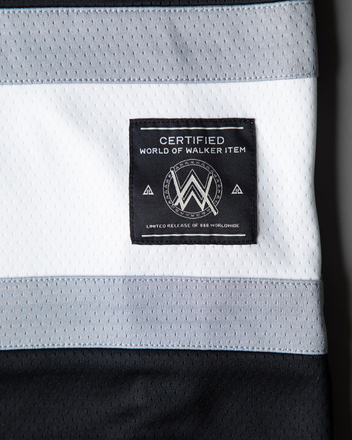 Alan Walker 8 Hockey Jersey stripe panel with the World of Walker Item tag stitched in place