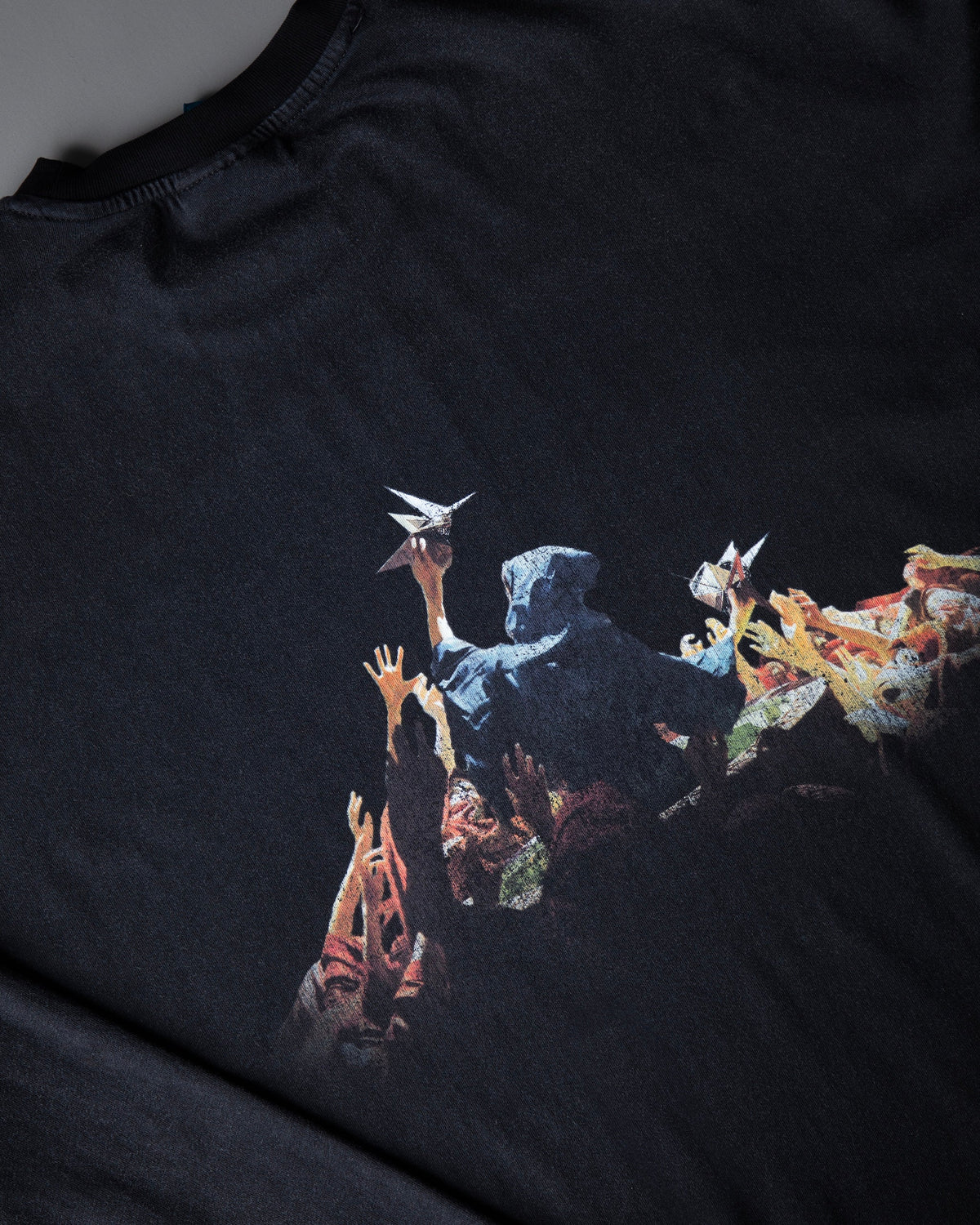 Alan Walker Heading Home Longsleeve back print detail, hooded Walker carried by a colourful crowd on black