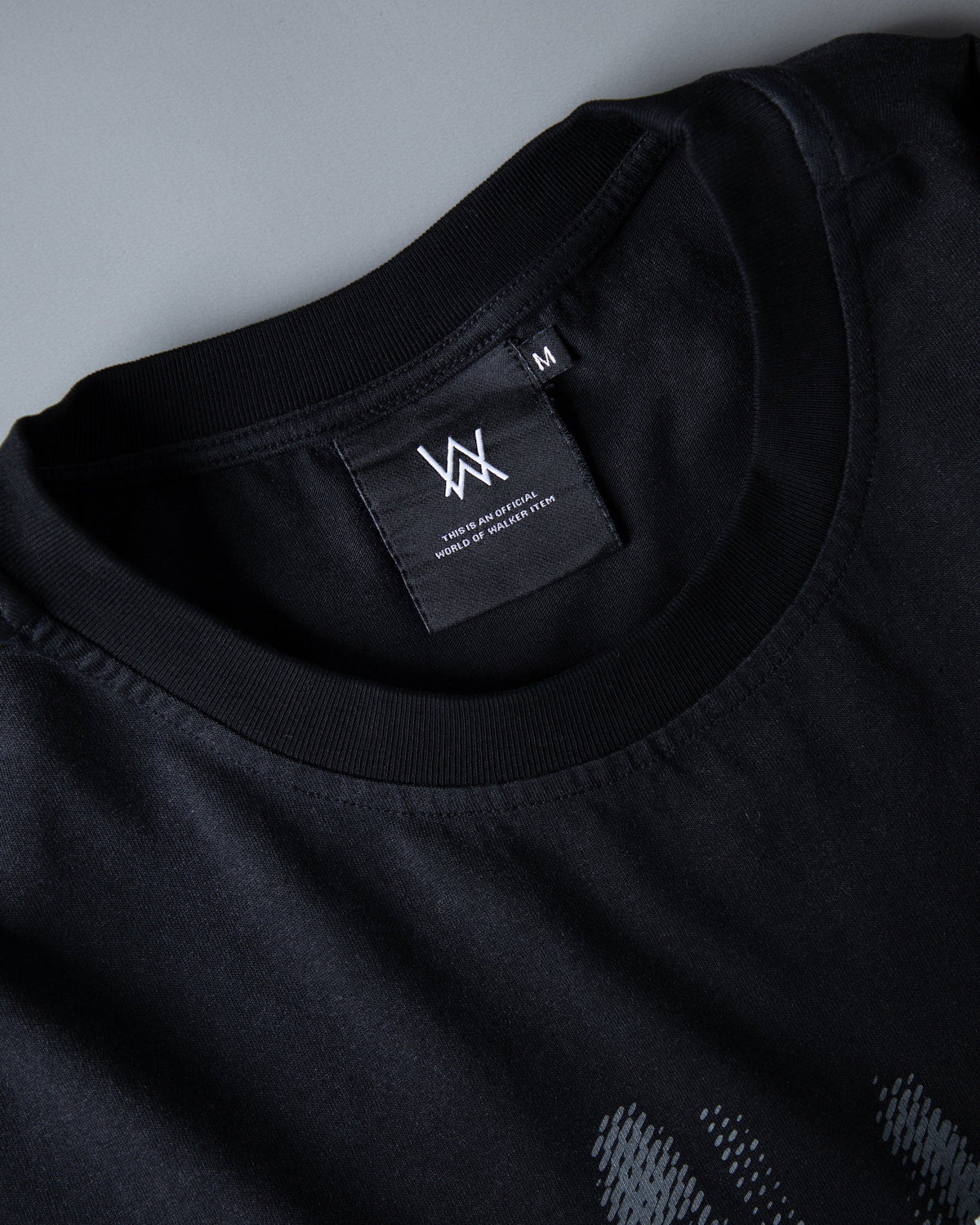 Alan Walker Faded Graffiti T-Shirt collar close-up, ribbed black neckline with the AW inner size label