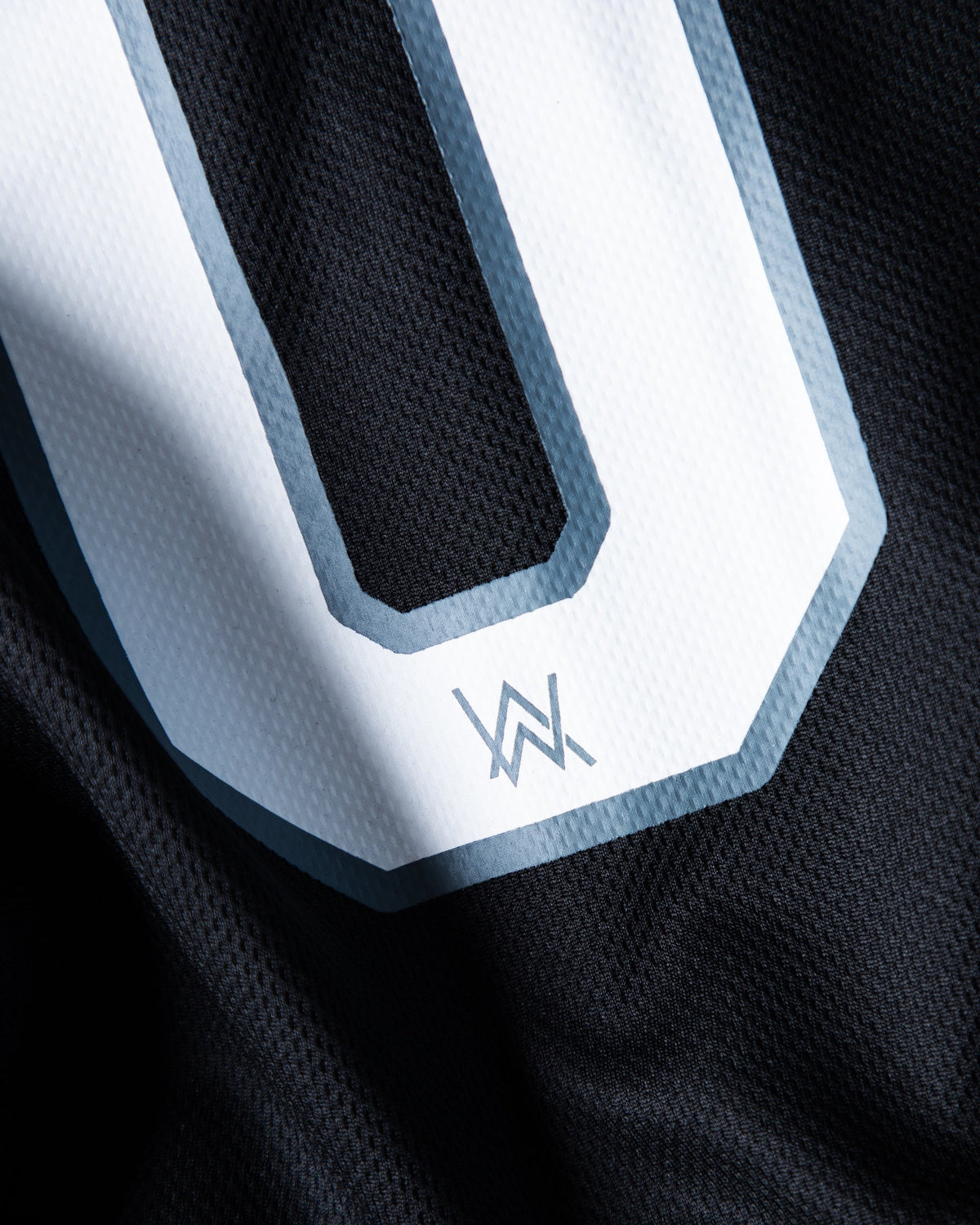 Alan Walker 8 Baseball Jersey number close-up, white twill 8 with grey trim and a small AW logo
