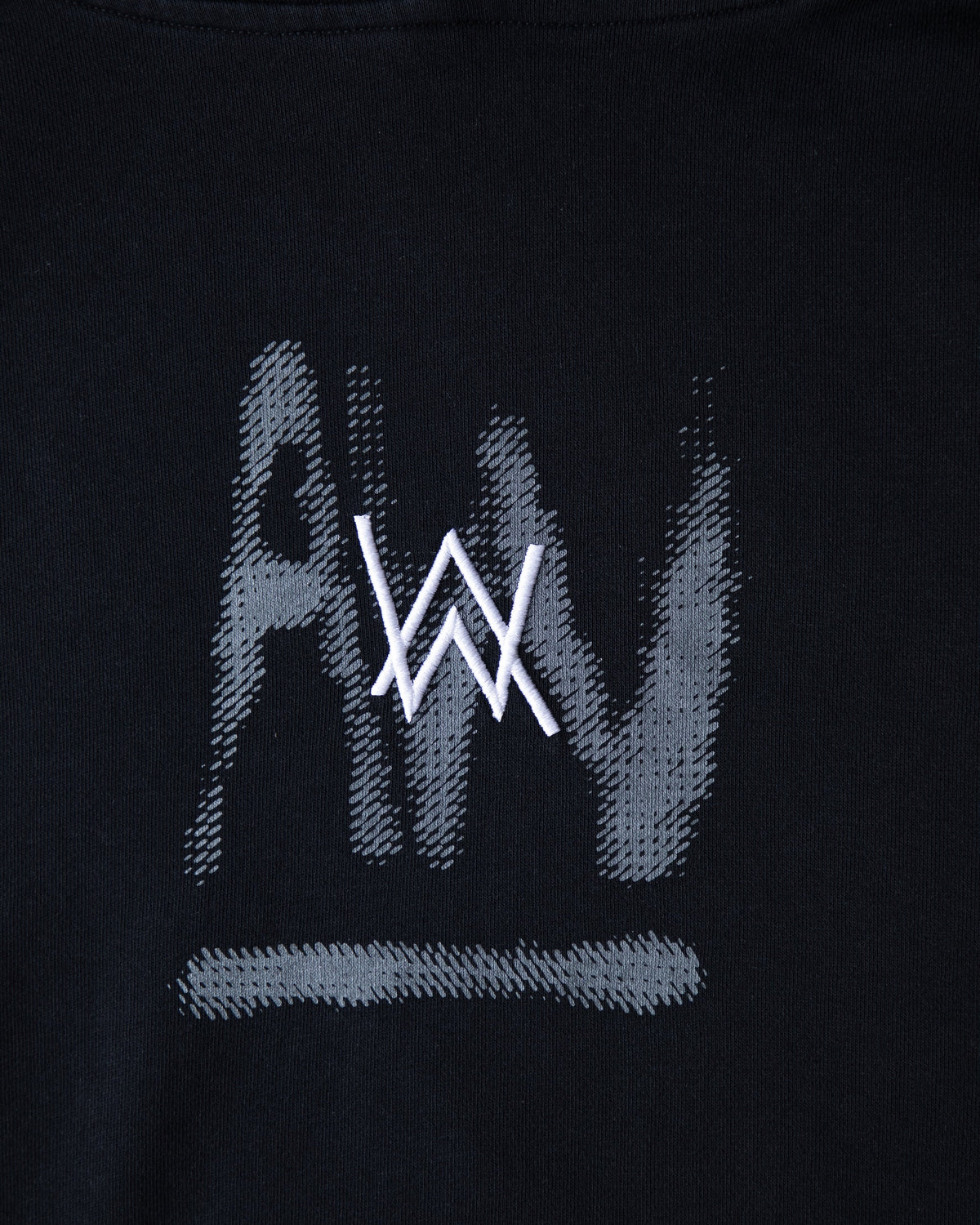 Alan Walker Faded Graffiti T-Shirt chest print close-up, crisp white AW monogram over the grey graffiti mark