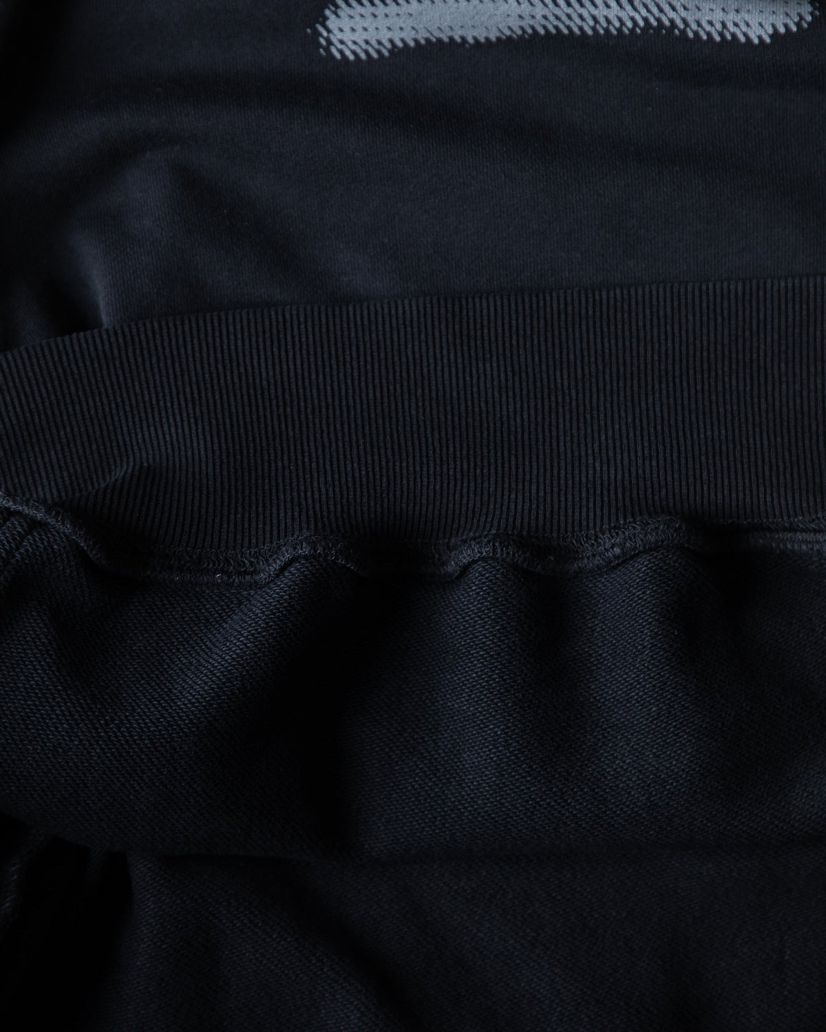 Alan Walker Faded Graffiti Hoodie black hem detail, ribbed cuff and waistband below the sprayed back print