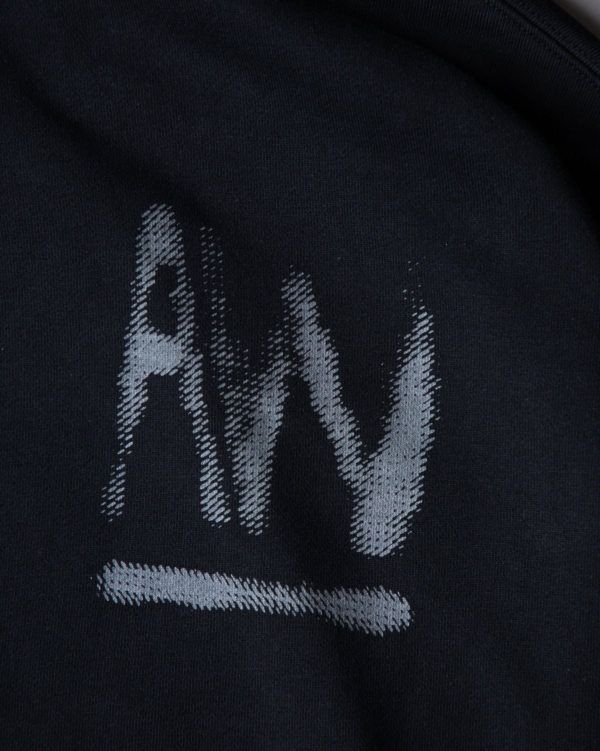 Alan Walker Faded Graffiti Hoodie chest print close-up, hand painted grey AW mark underlined on black