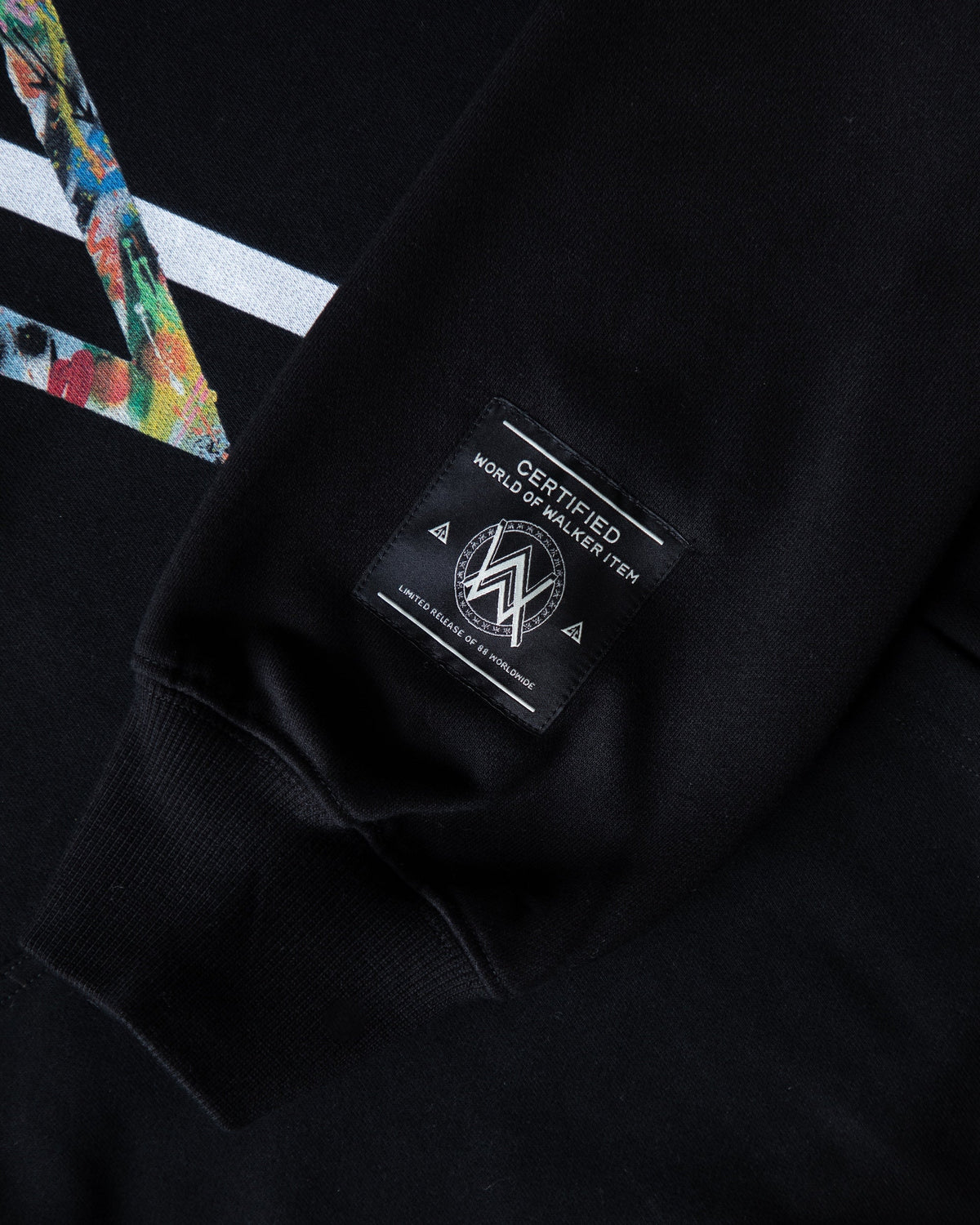 Alan Walker Tired 0 Hoodie cuff detail, World of Walker label below the colourful AW logo print