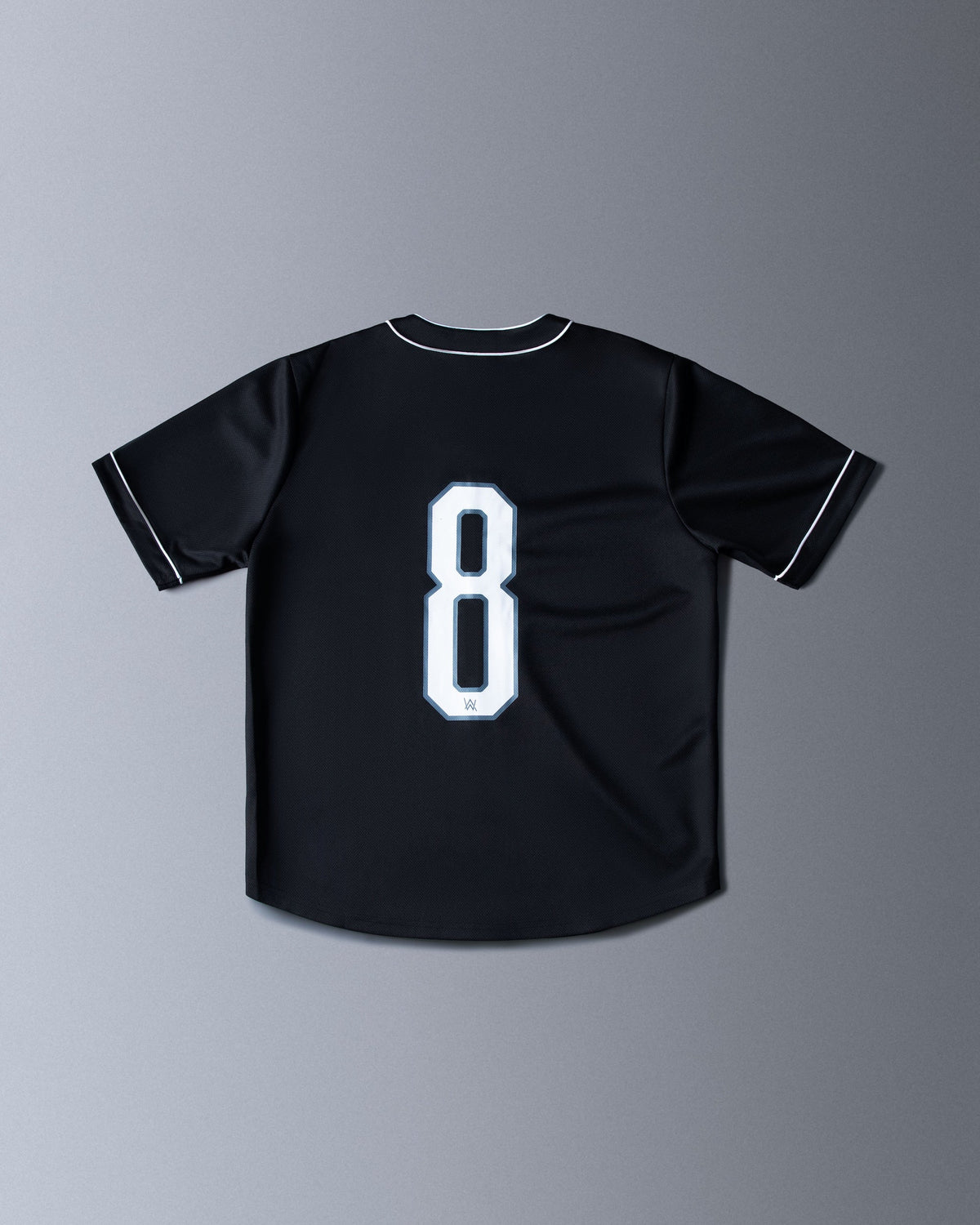 Alan Walker 8 Baseball Jersey back flat lay in black with the tall white number 8 and piped sleeve trim