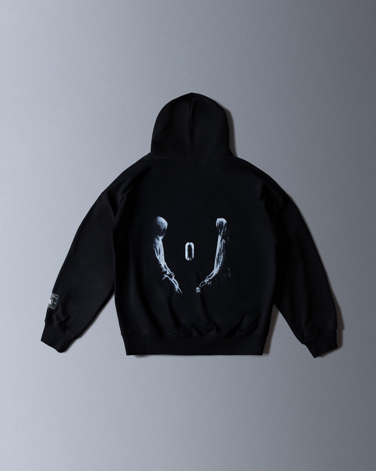 Alan Walker Tired 0 Hoodie in black, back flat lay with the two hooded figures and glowing zero graphic
