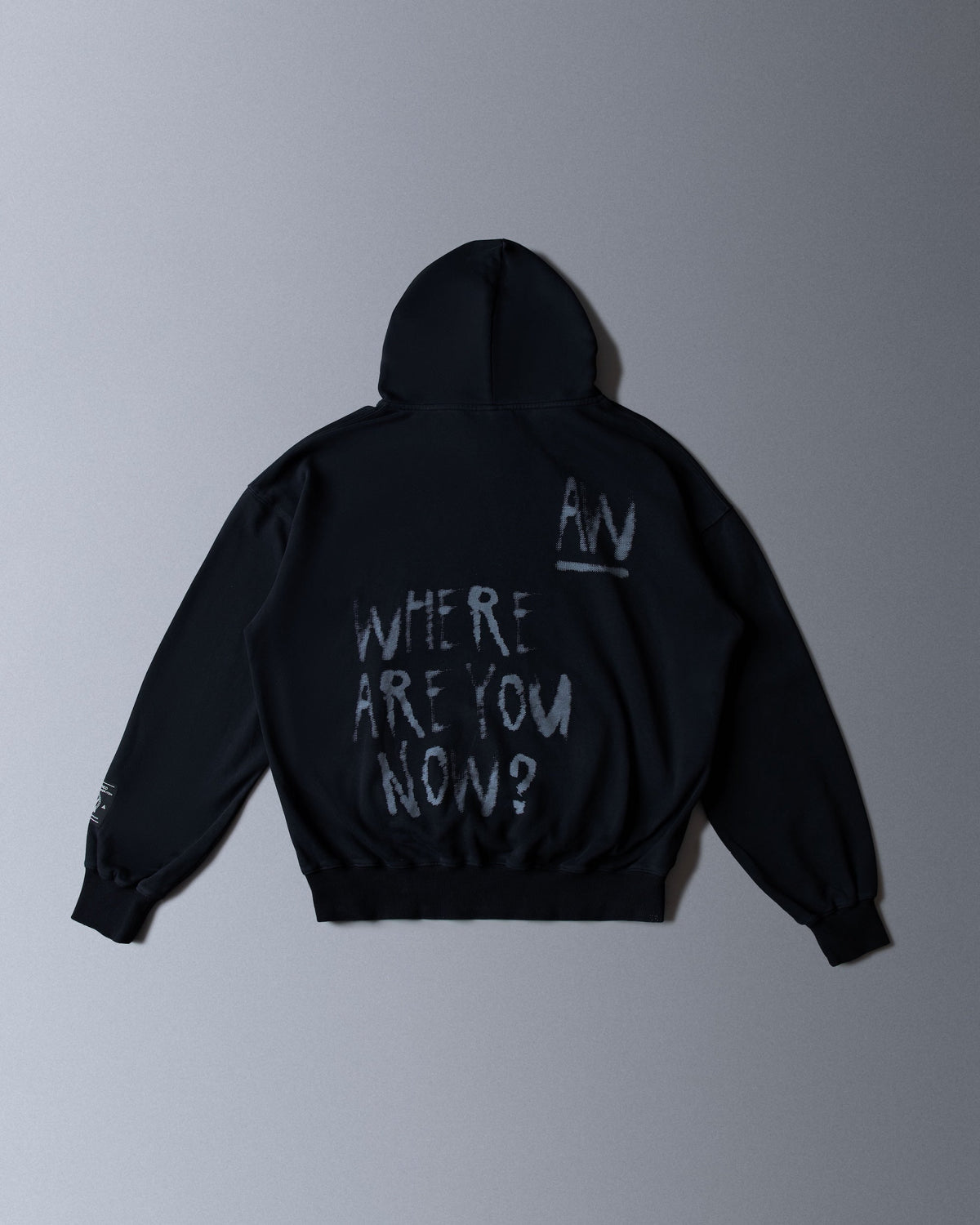 Alan Walker Faded Graffiti Hoodie in black, back flat lay with the painted Where Are You Now lyric print