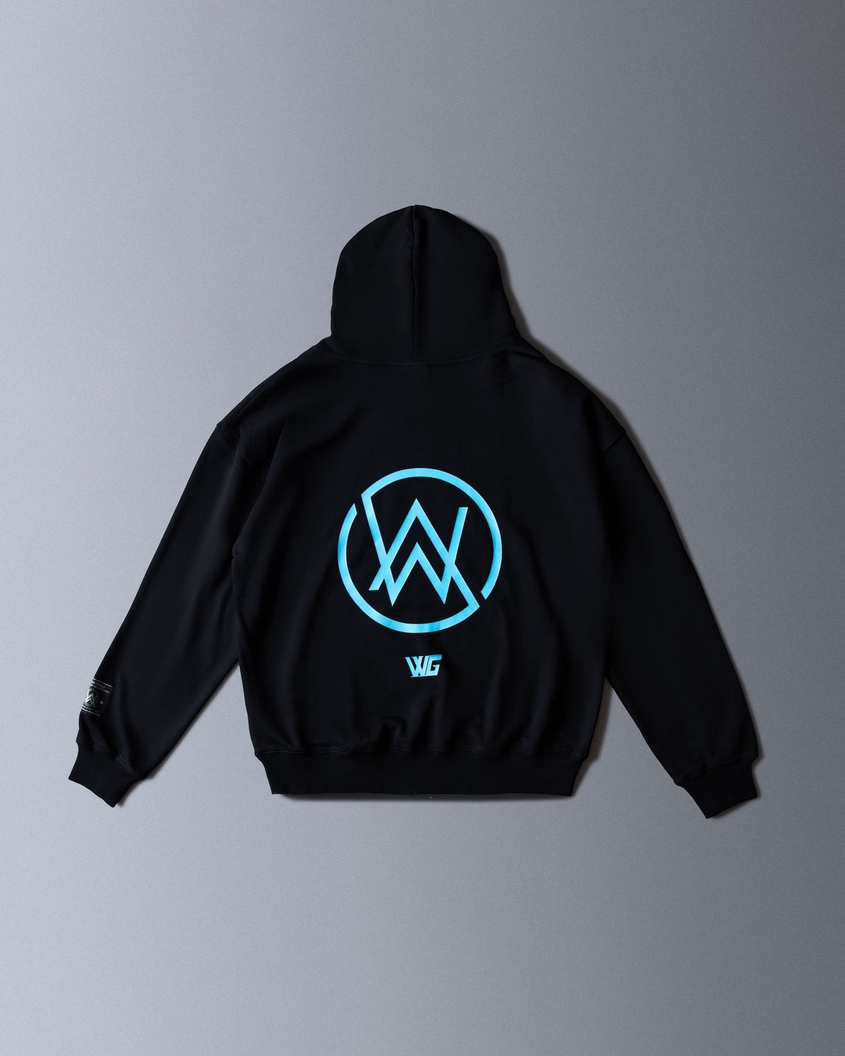 Alan Walker Gaming Hoodie back flat lay in black with the blue ringed AW logo and WG initials