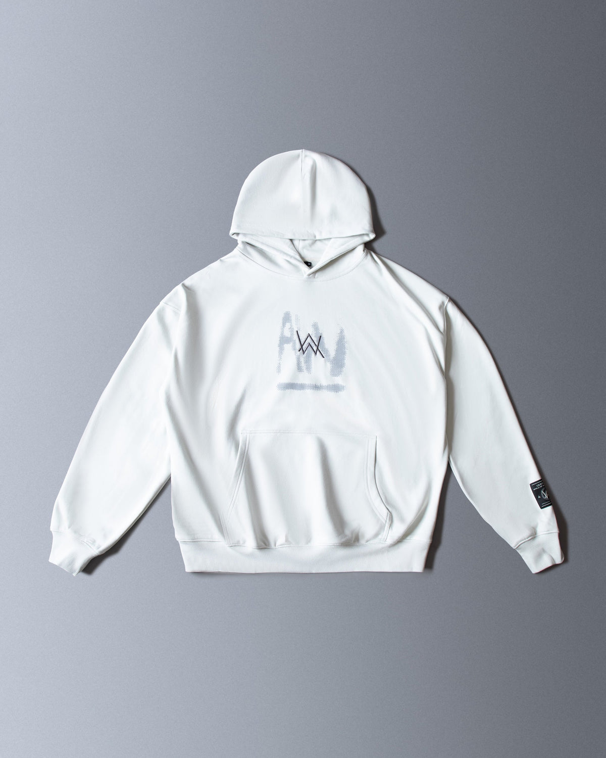 Alan Walker Faded Graffiti Hoodie in off white, front flat lay with the painted grey AW chest logo