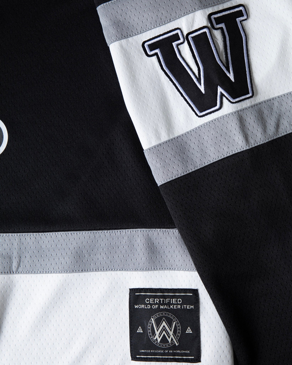 Alan Walker 0 Hockey Jersey sleeve detail, W patch on the white stripe with the Walker hem tag