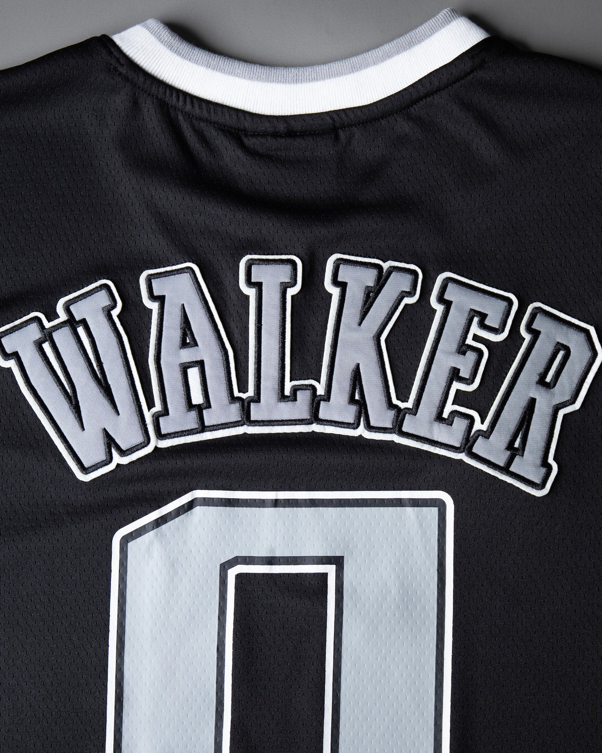 Alan Walker 0 Hockey Jersey back detail, arched grey Walker nameplate stitched above the white number 0