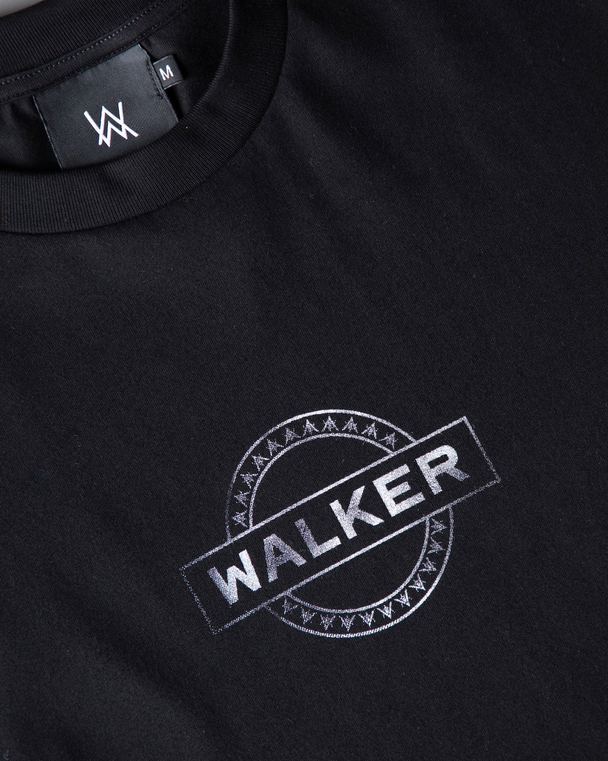 Alan Walker Monster Core Longsleeve neckline detail, AW size label above the angled WALKER stamp on black