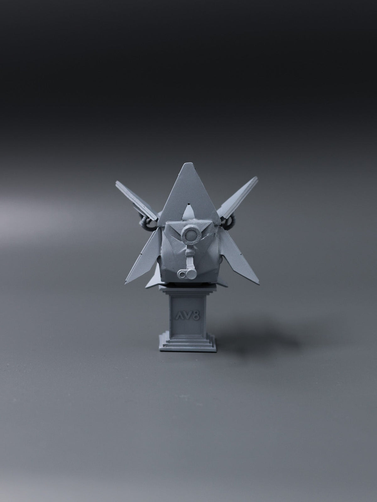 Alan Walker AV8 Figurine three quarter view, detailed grey collectible on an AV8 branded pedestal base