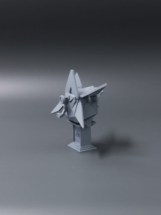 Alan Walker AV8 Figurine at an angle, grey winged AW statue on a stepped plinth against a dark backdrop