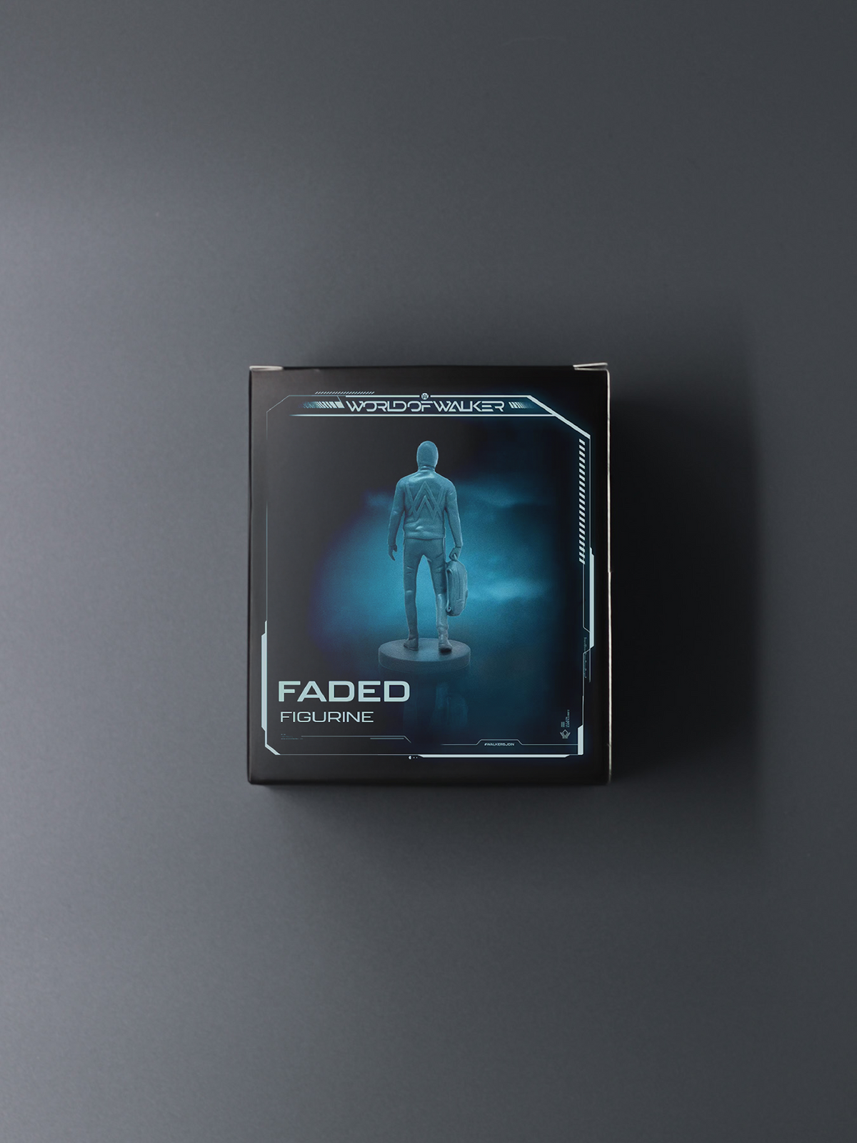 Alan Walker Faded Figurine in its collector box, blue window packaging showing the hooded Walker statue