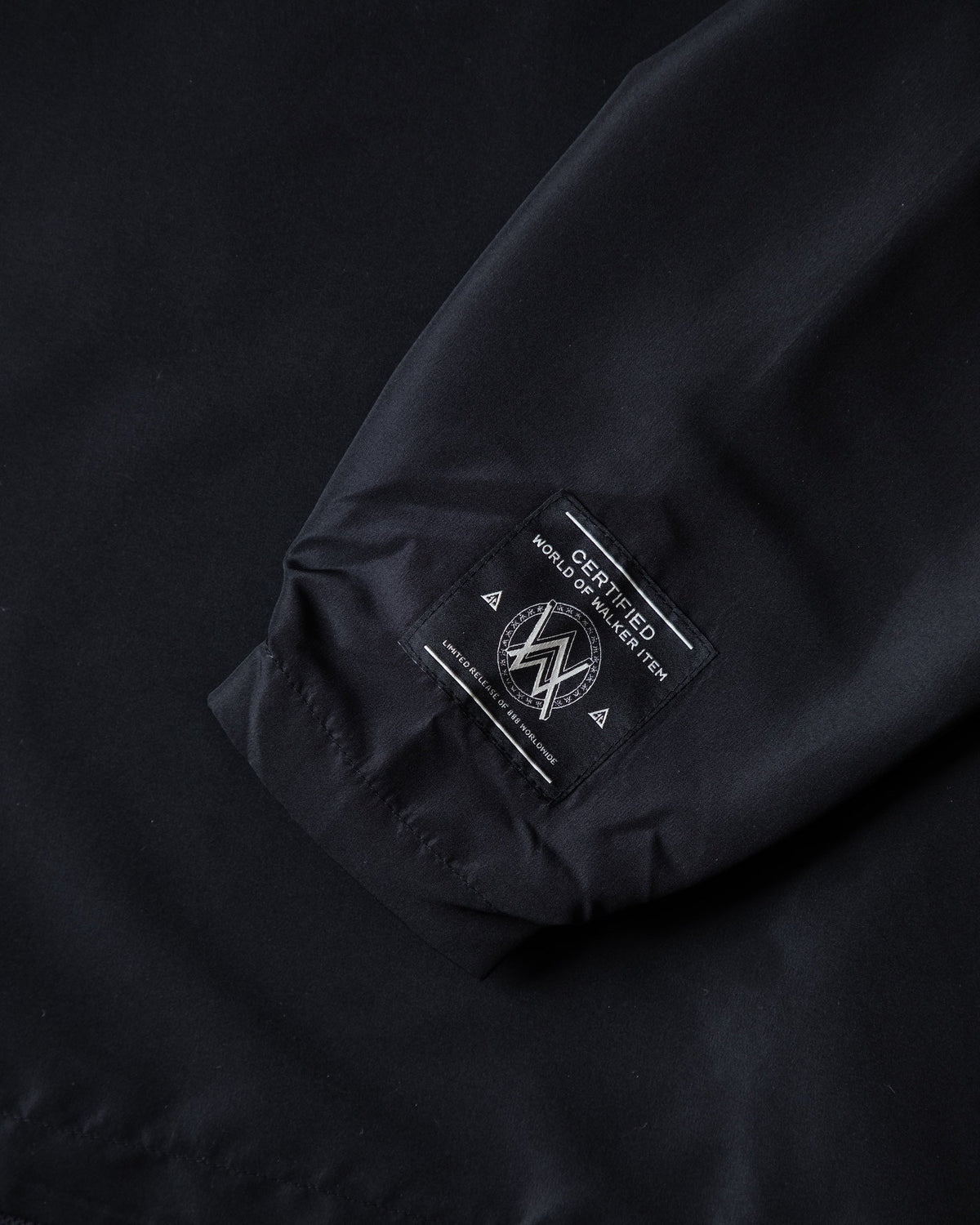 Alan Walker Core LV1 Windbreaker sleeve detail, woven woven World of Walker label on the black cuff