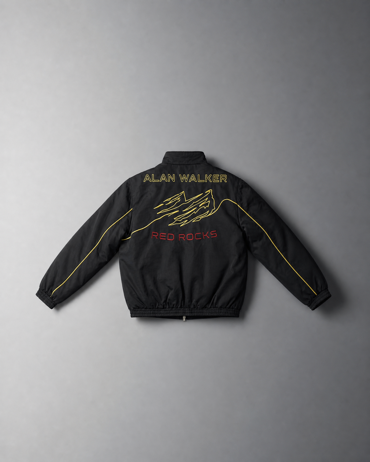 Alan Walker Legendary Sandstone Jacket in black, back flat lay with Alan Walker and Red Rocks embroidery