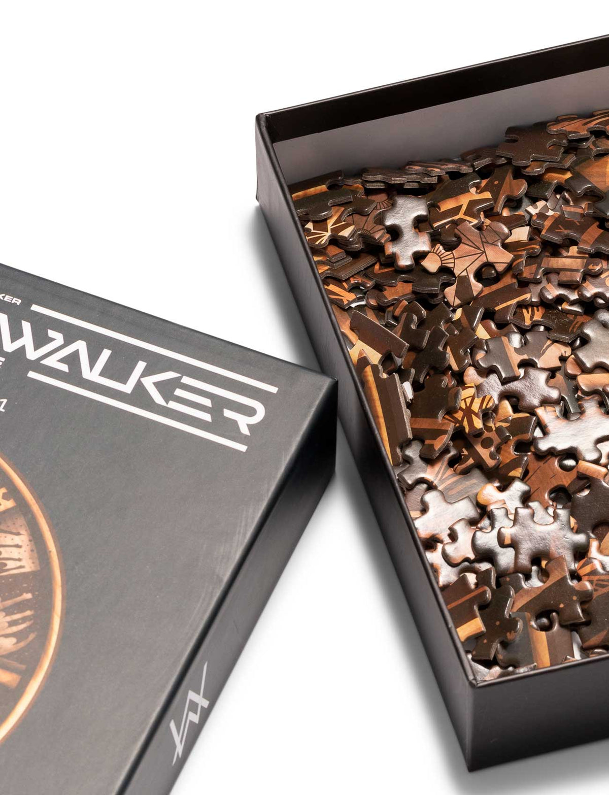 Alan Walker World of Walker Puzzle Prophecy Disk 1 open box revealing loose bronze toned jigsaw pieces