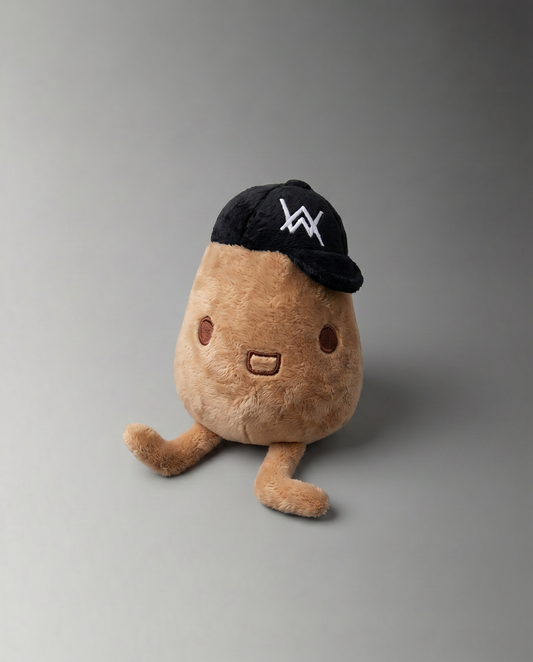 Alan Walker Tato Plushie front view, soft brown potato character in a black AW cap sitting with its little legs out