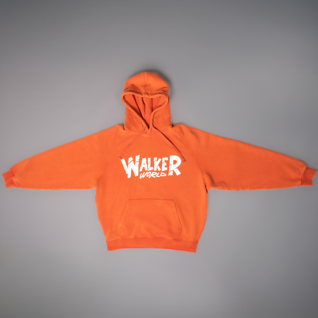 Alan Walker Walkerworld Logo Hoodie orange flat lay from above, white Walkerworld script across the chest