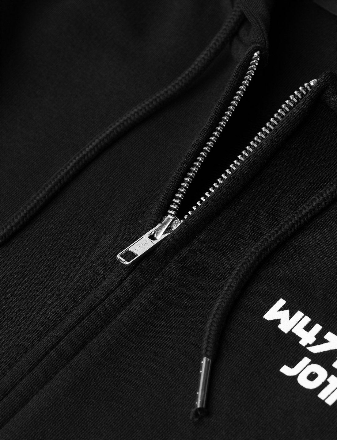 Alan Walker Core Logo Zip Hoodie hardware detail, metal front zip and hood drawcord beside white chest text