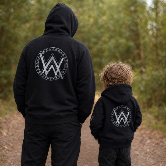 Alan Walker Monster Core Logo Hoodie Bundle worn by an adult and child on a forest path, matching AW crest back prints