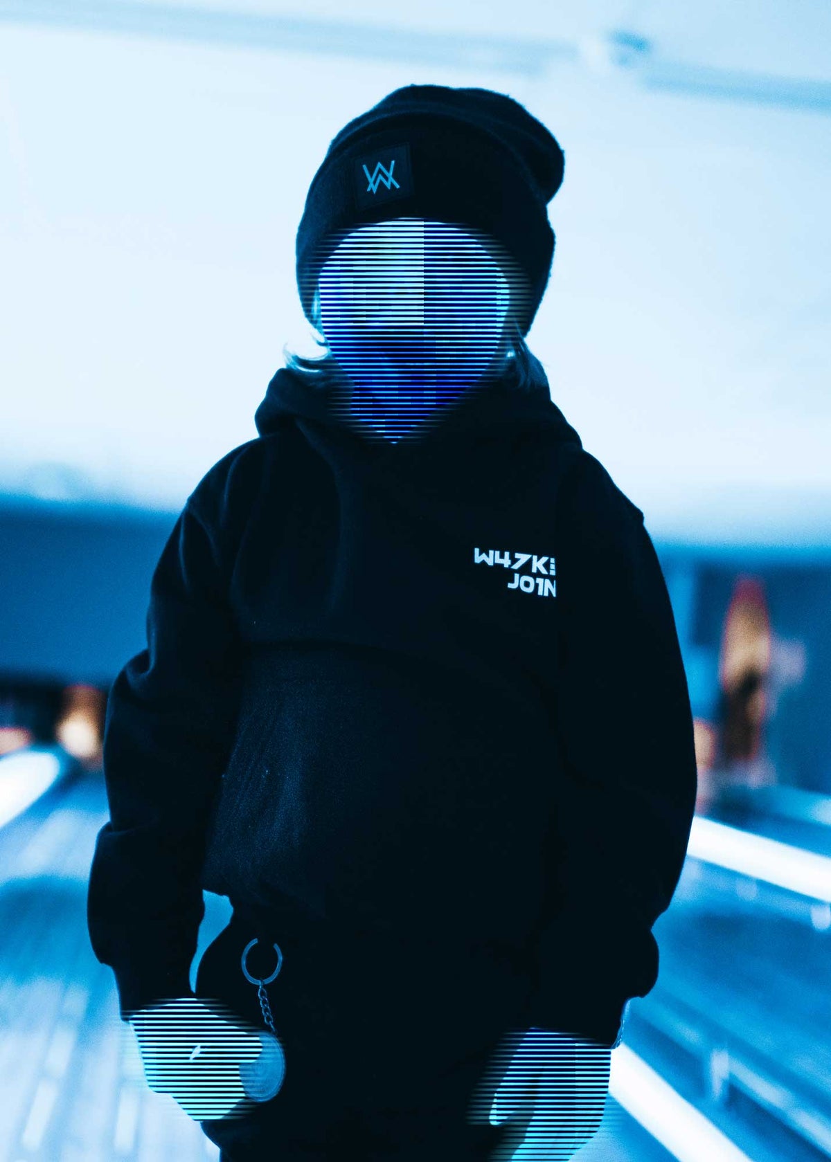 Alan Walker Kids Logo Hoodie worn by a child with a beanie and light up mask in a bright lifestyle shot