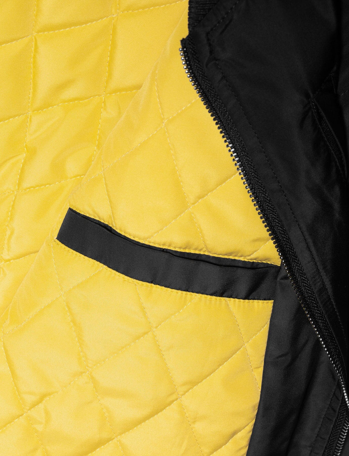 Alan Walker Walkerverse Bomber Jacket interior, quilted yellow lining with a black inner pocket trim